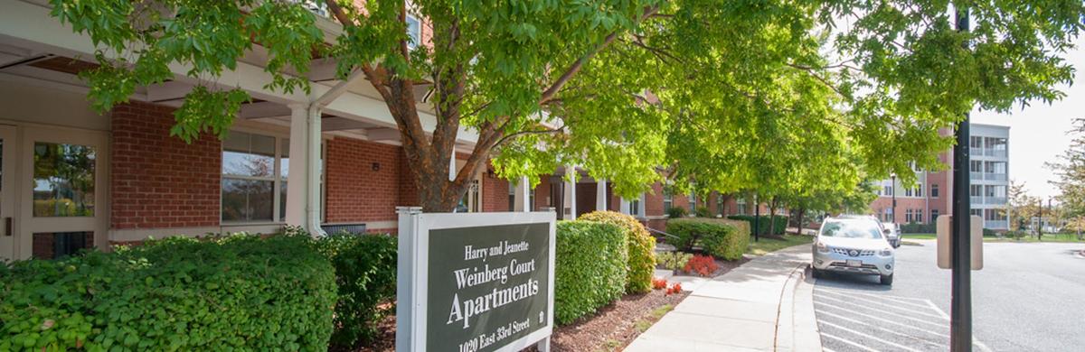 harry & jeanette weinberg court apartments sign